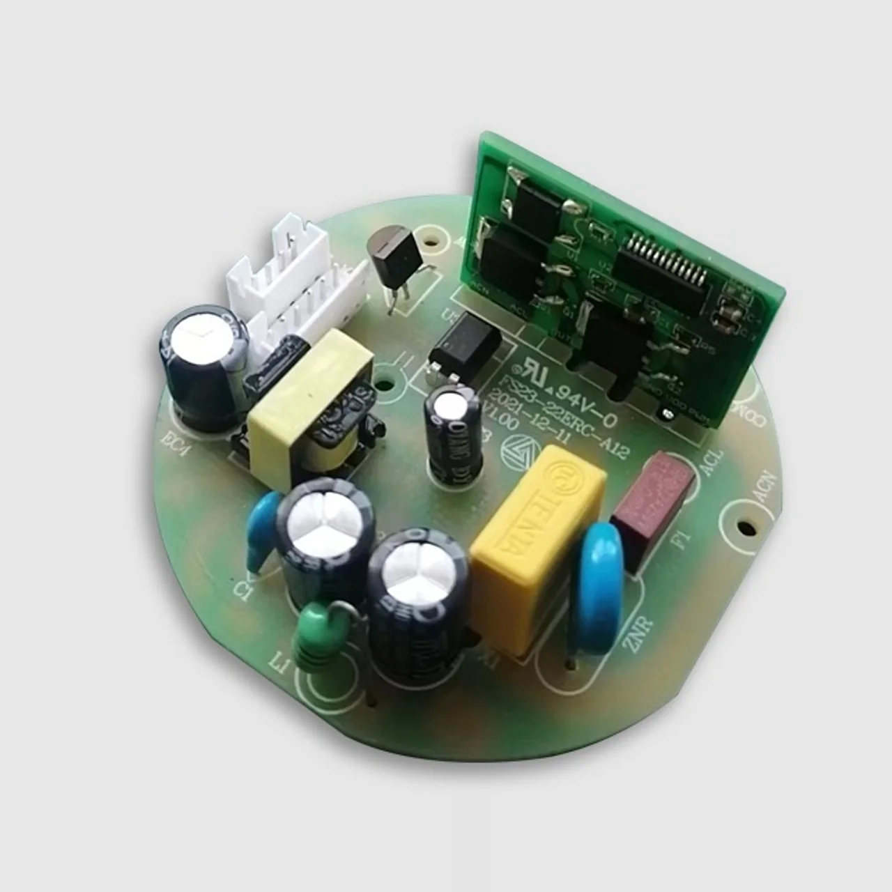 Source photograph of a round power control board used to illustrate quality record categories